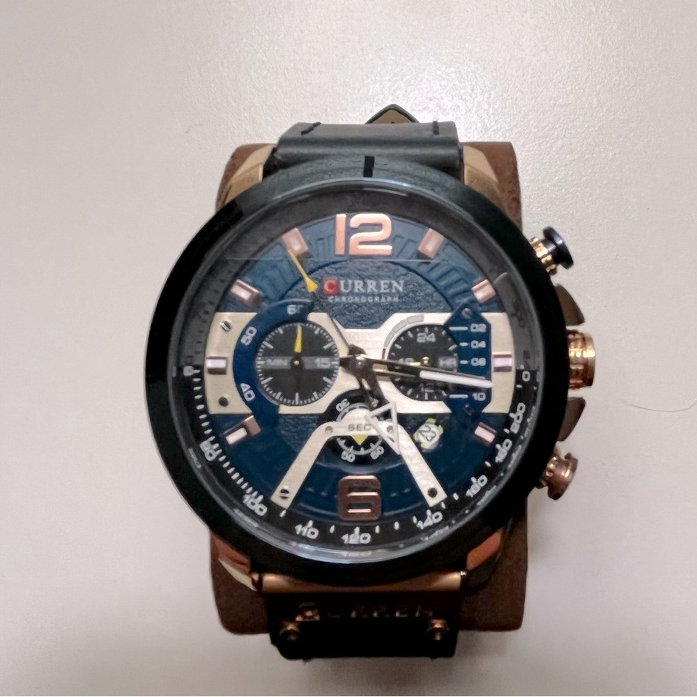 Blue CURREN watch with blue leather strap